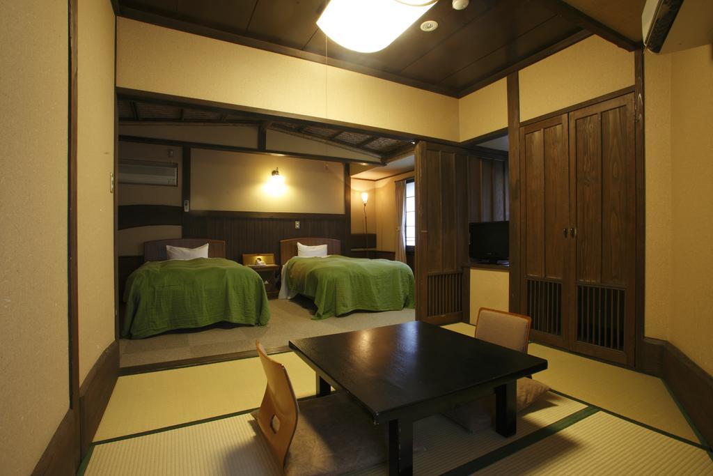 Oyado Kurokawa Hotell Aso Rom bilde