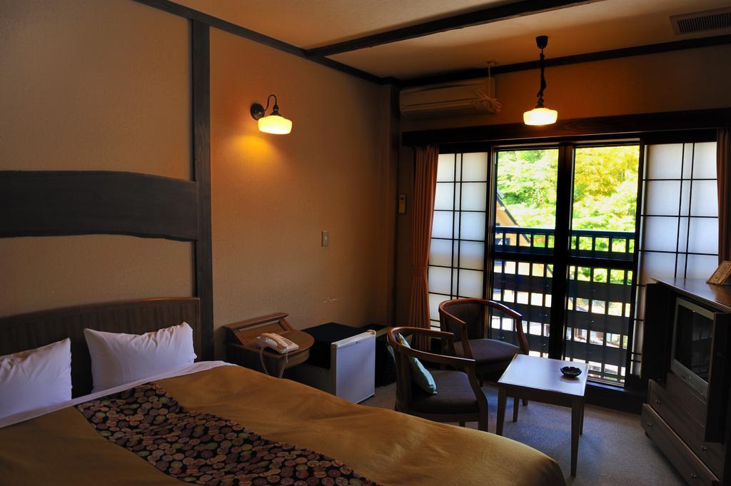 Oyado Kurokawa Hotell Aso Rom bilde